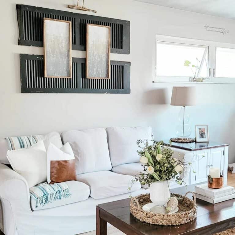 White and Black Living Room With Unique Wall Décor