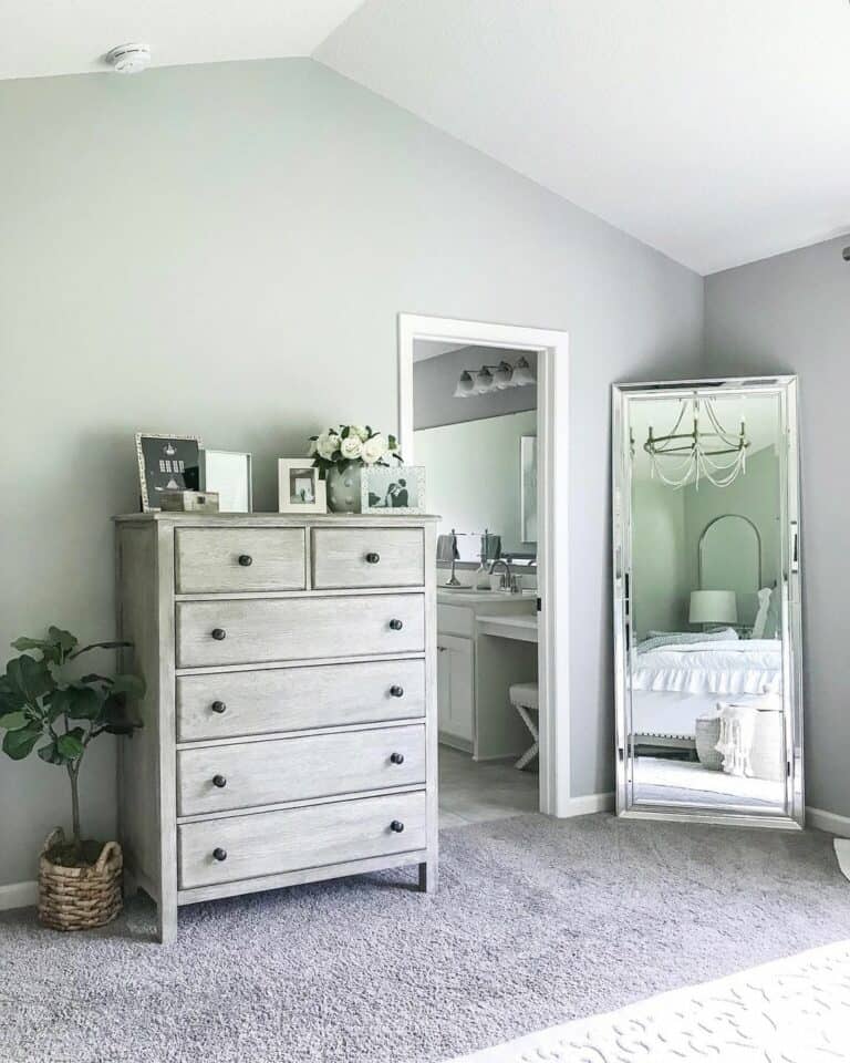 White and Gray Bedroom With Vaulted Ceiling