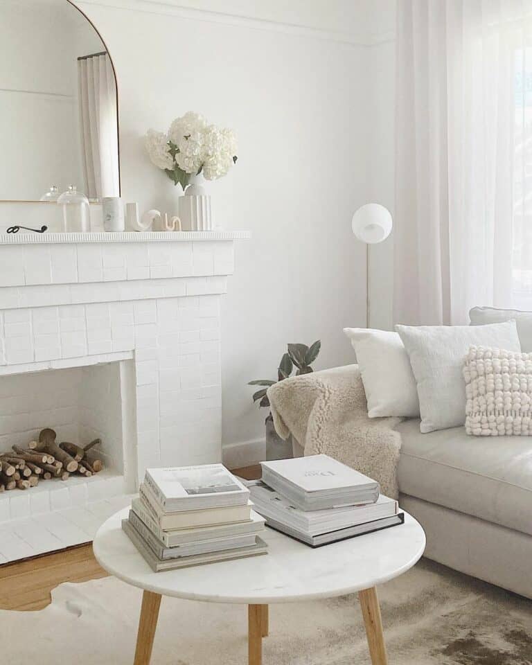 White-themed Living Room With Fireplace