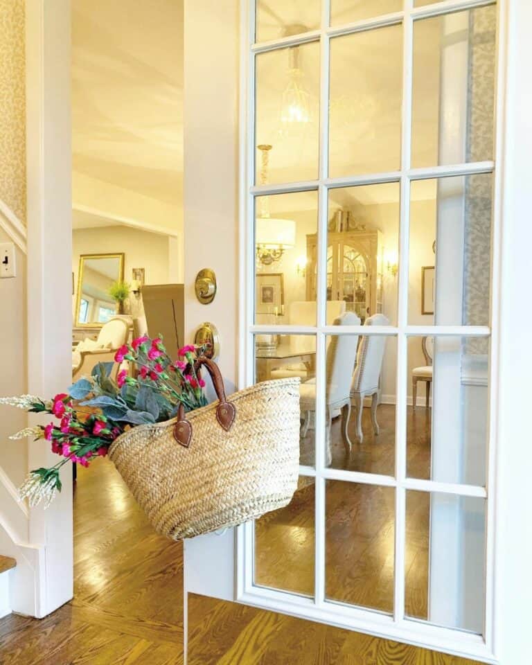 Wicker Basket Hanging on a White French Door