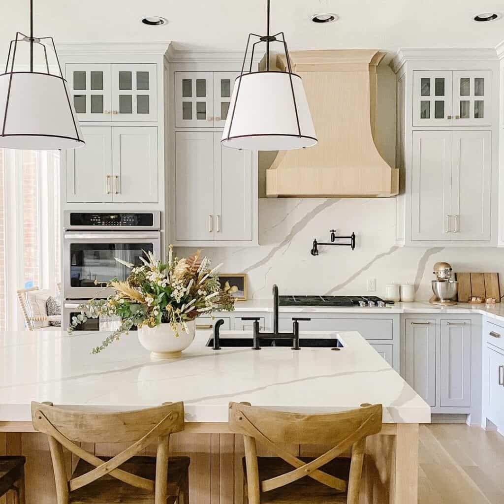 Wood and White Kitchen Island With Fall Flowers