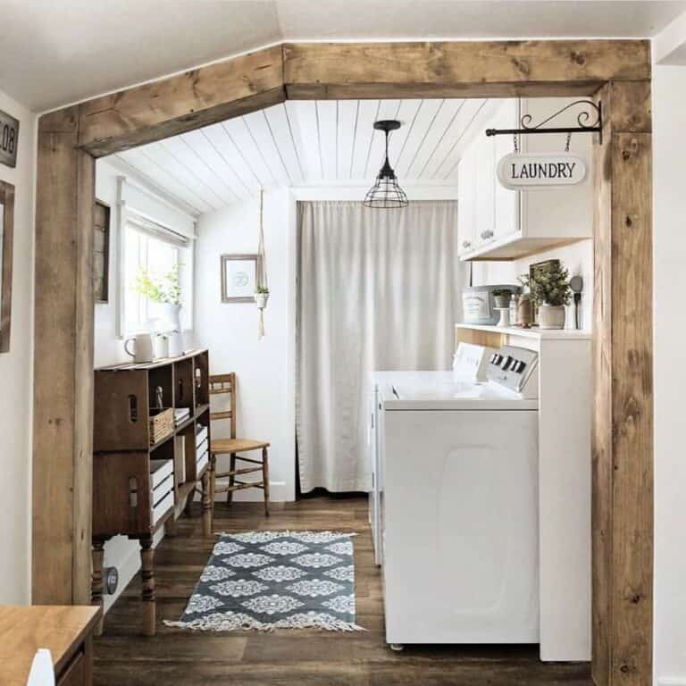 Wooden Door Frame Surrounds Rustic Laundry Room