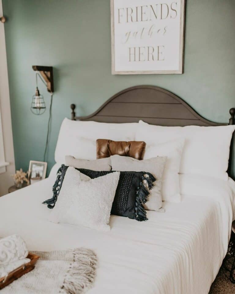 Wooden Headboard Accessorized With Layered Pillows