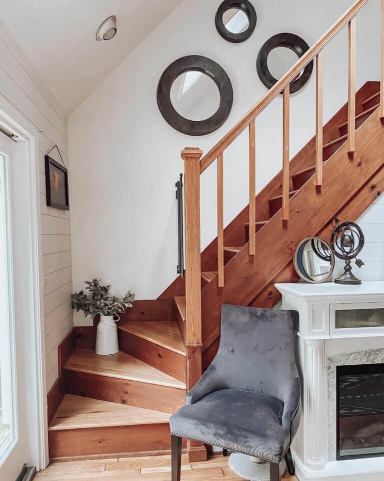 Wooden Stairs With Mirror Gallery Wall