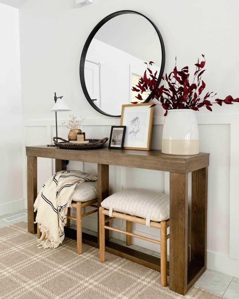 Wooden Stools Tucked Beneath Console Table