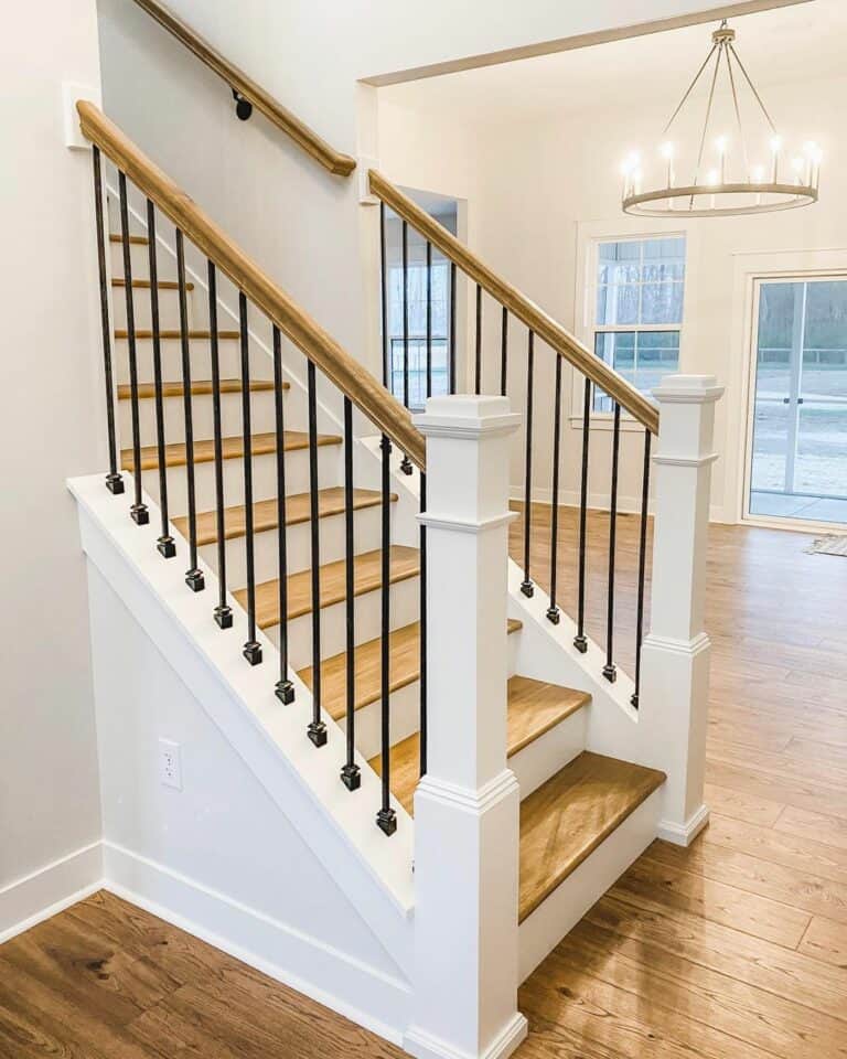 Wooden and White Steps With Black Balusters