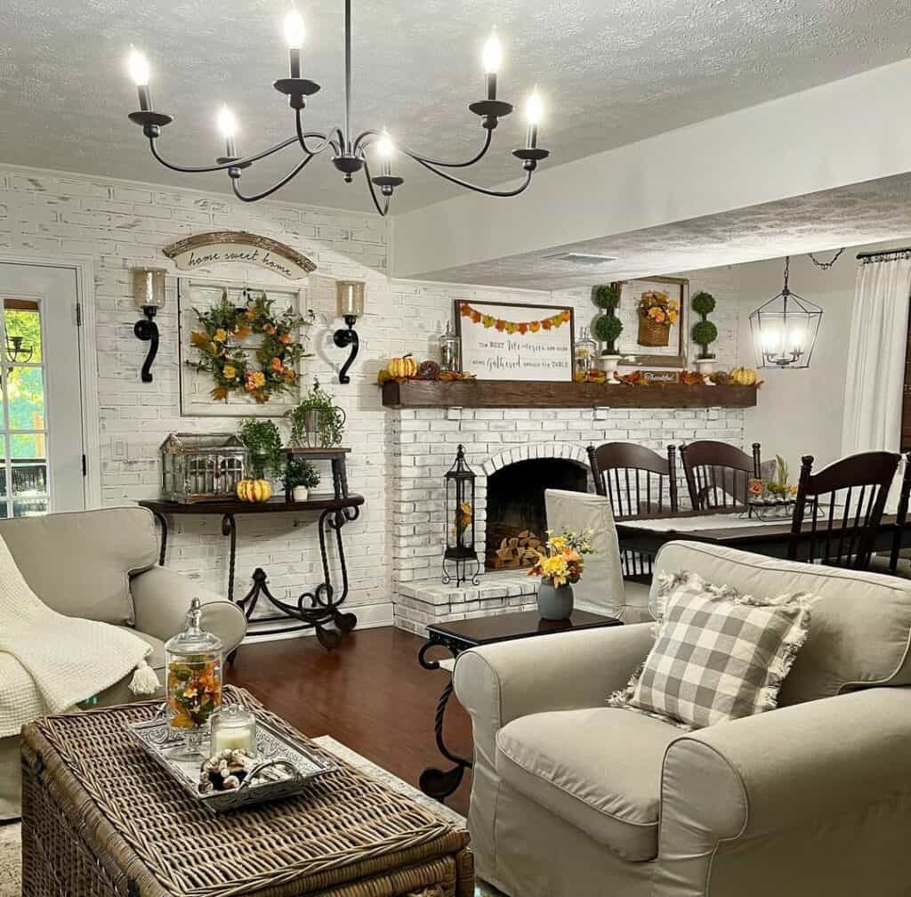 Woven Coffee Table Beneath a Black Chandelier - Soul & Lane
