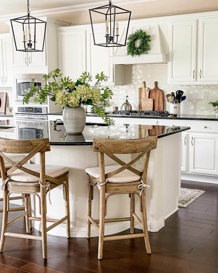 Yellow Flowers and Green Foliage on a Black Counter