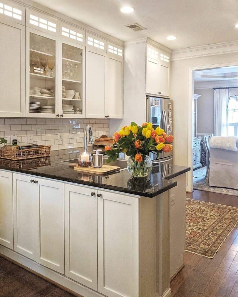 Yellow and Pink Tulips on a Black Countertop