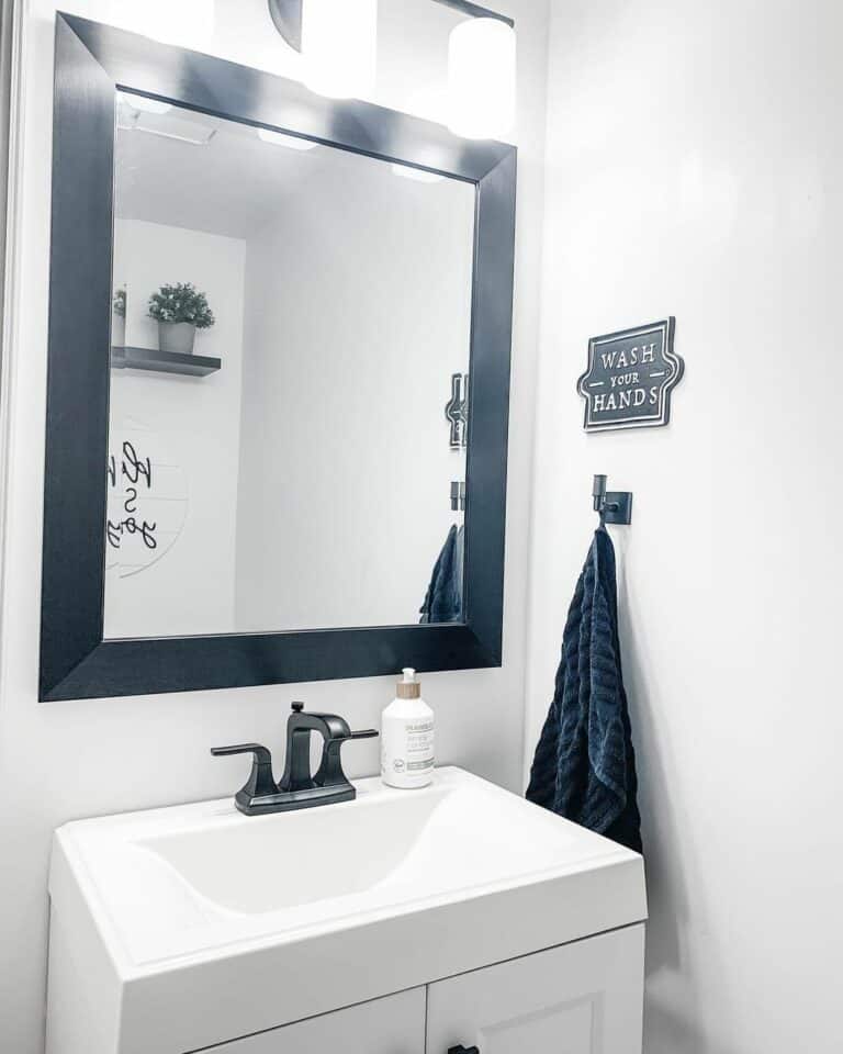 Accent With Black in Small White Bathroom