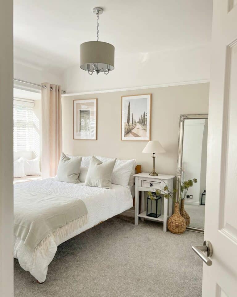 Artwork Above White and Gray Bed