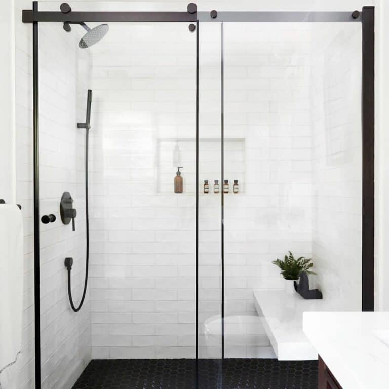 Bathroom With Black-accented Sliding Glass Doors