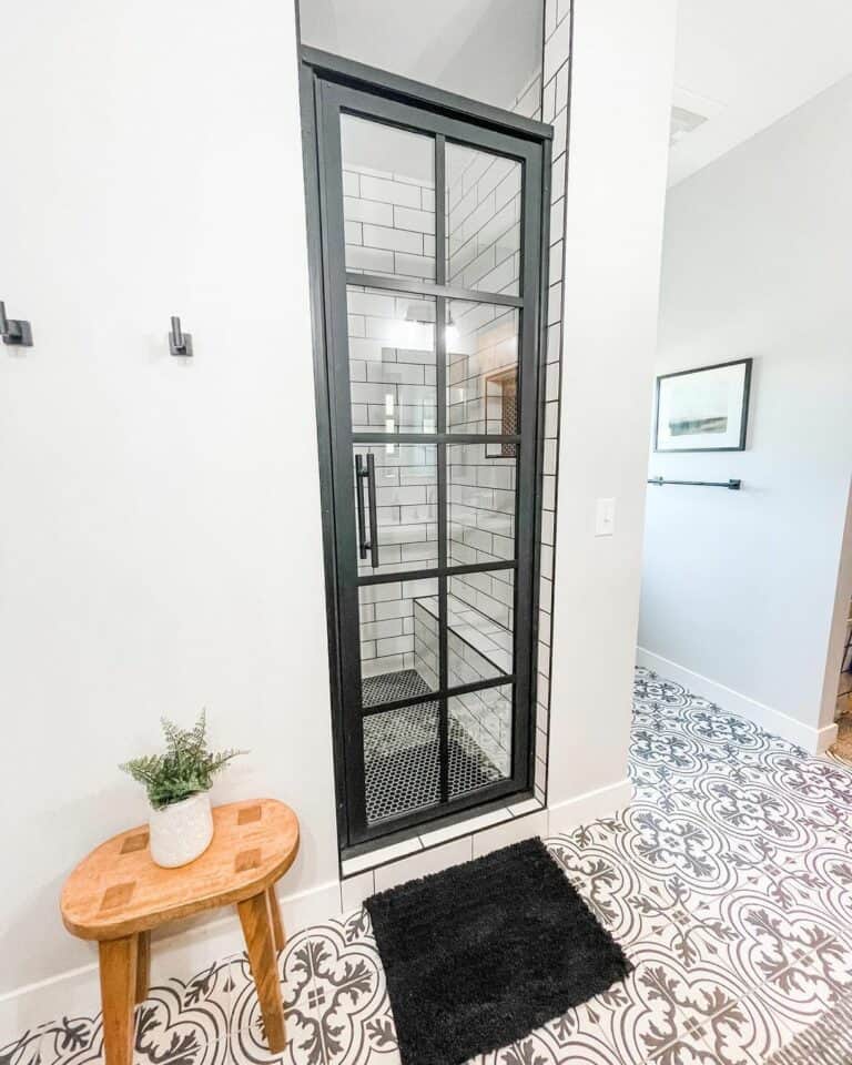 Bathroom With Black-accented Walk-in Shower Glass Door