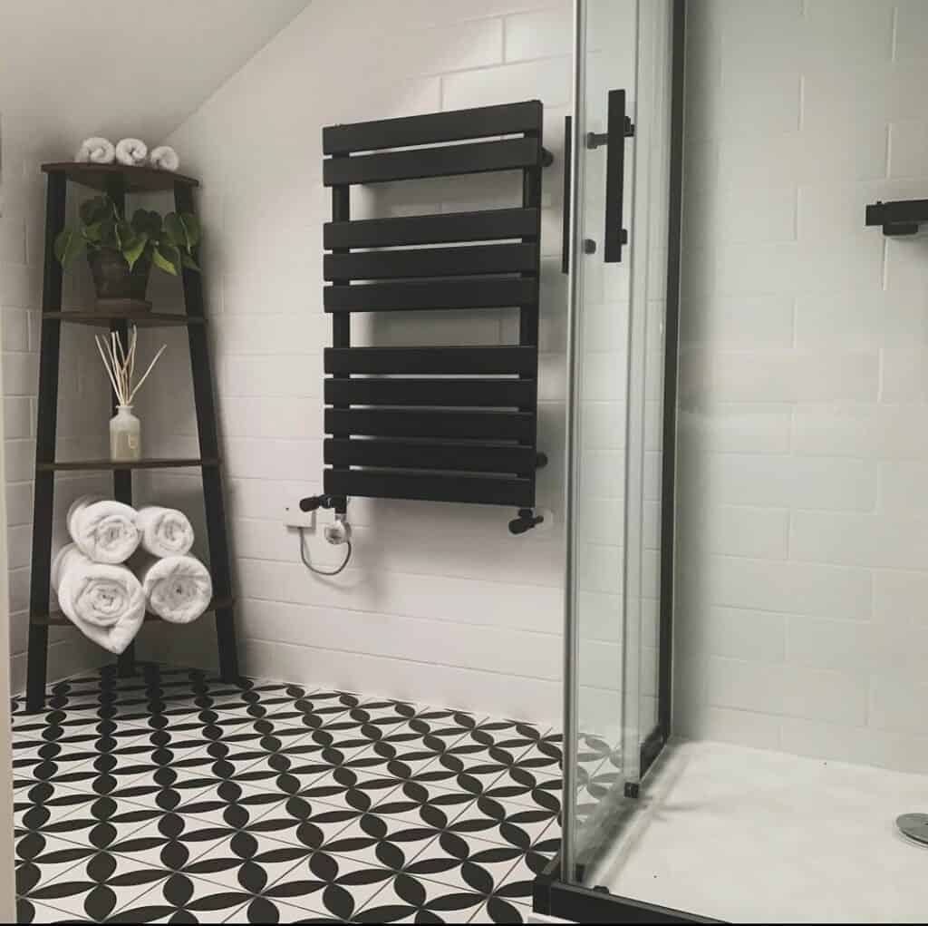Bathroom With BlackandWhite Geometricpatterned Floor Tiles Soul & Lane