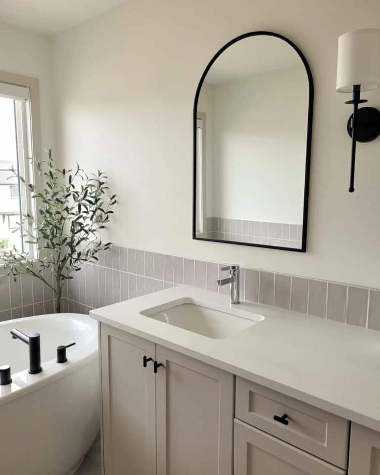 Bathroom With Gray Stacked Tile Half Wall