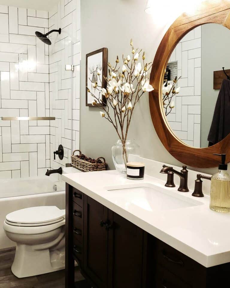Bathroom With White Herringbone Tile Shower