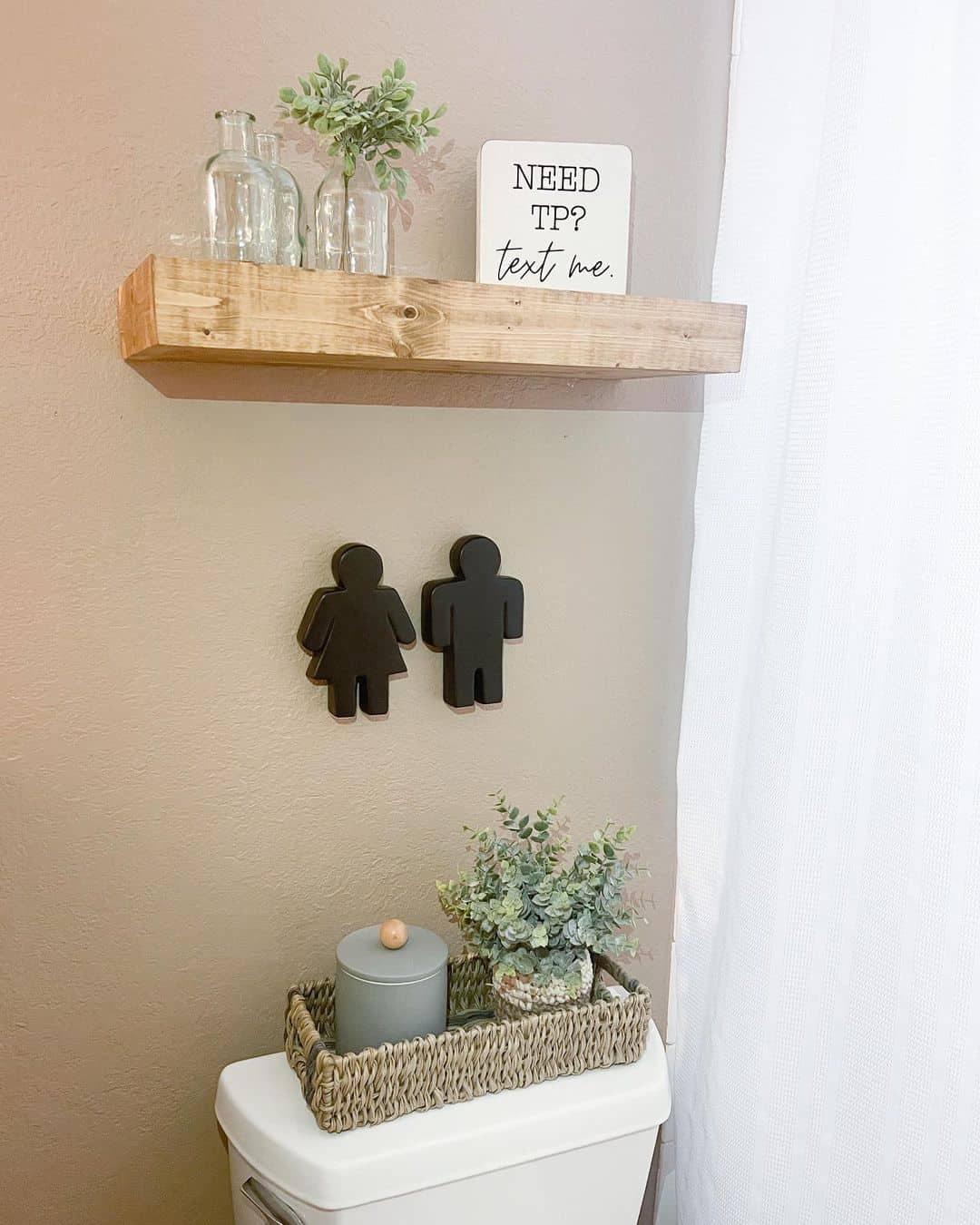 Beige Bathroom With Silhouette Ornaments - Soul & Lane