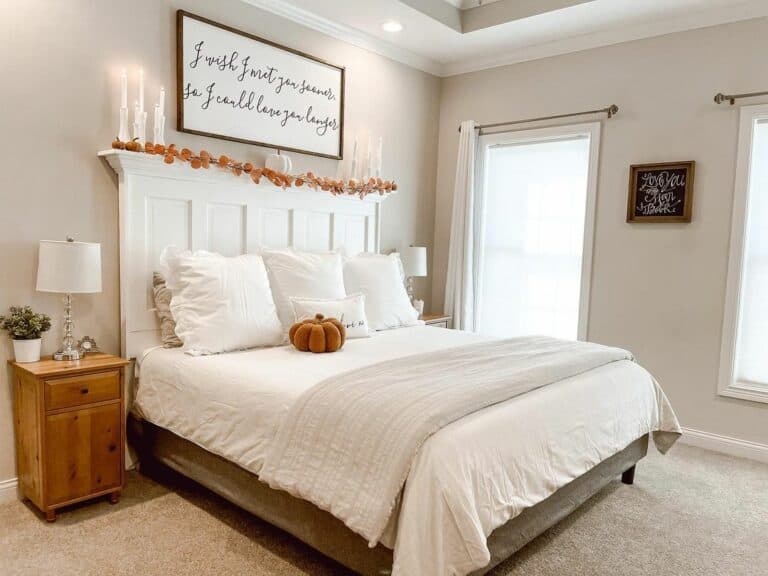 Beige Walls Complement a High Headboard