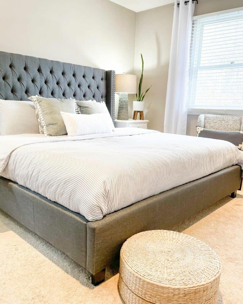 Beige and Grey Bedroom With Rattan Floor Cushions