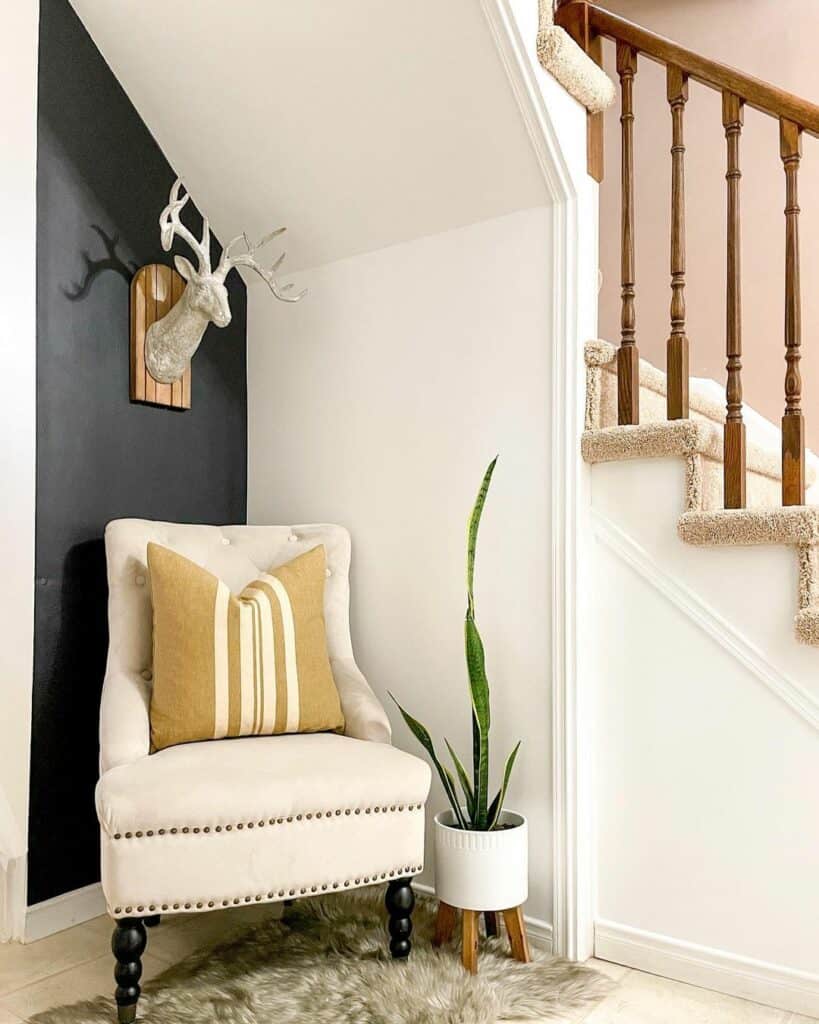 Black Foyer Accent Wall With Beige Corner Chair