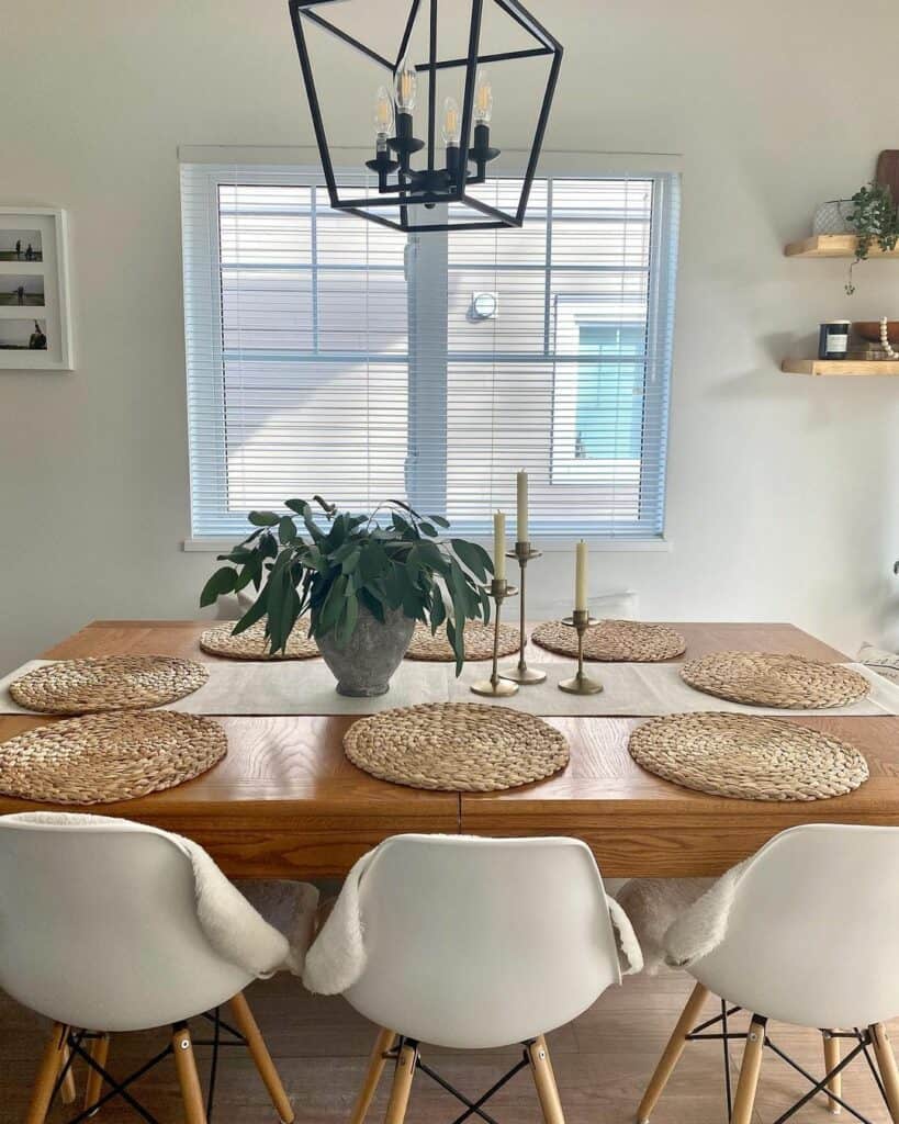 Black Lantern Pendant Over Wood Dining Table