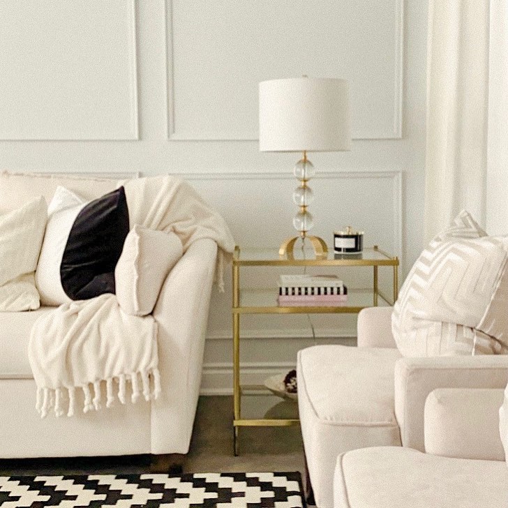 Black Rug Contrasts With White Walls