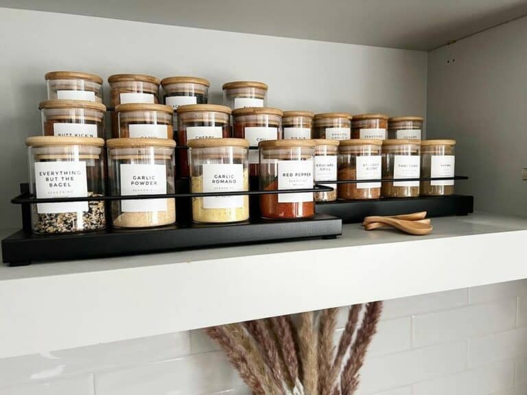 Black Spice Rack Occupies White Shelf