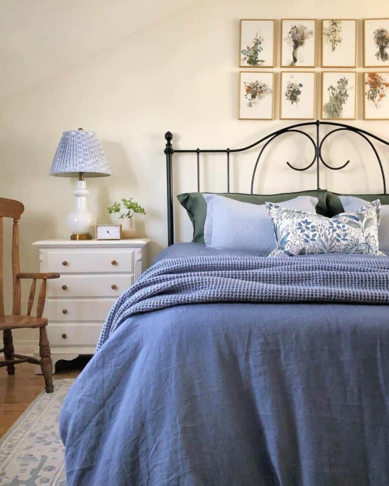 Blue Bedroom With Art Pieces