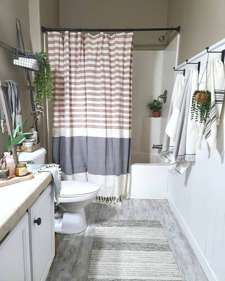 Boho Bathroom Featuring a Tasseled Shower Curtain Soul & Lane