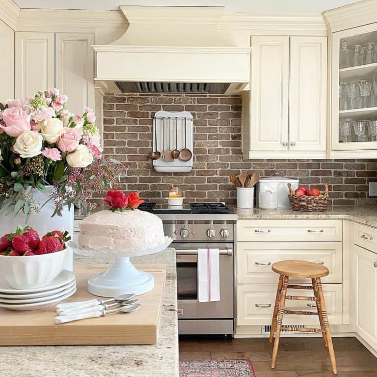 Brick-walled Kitchen With Granite Countertop