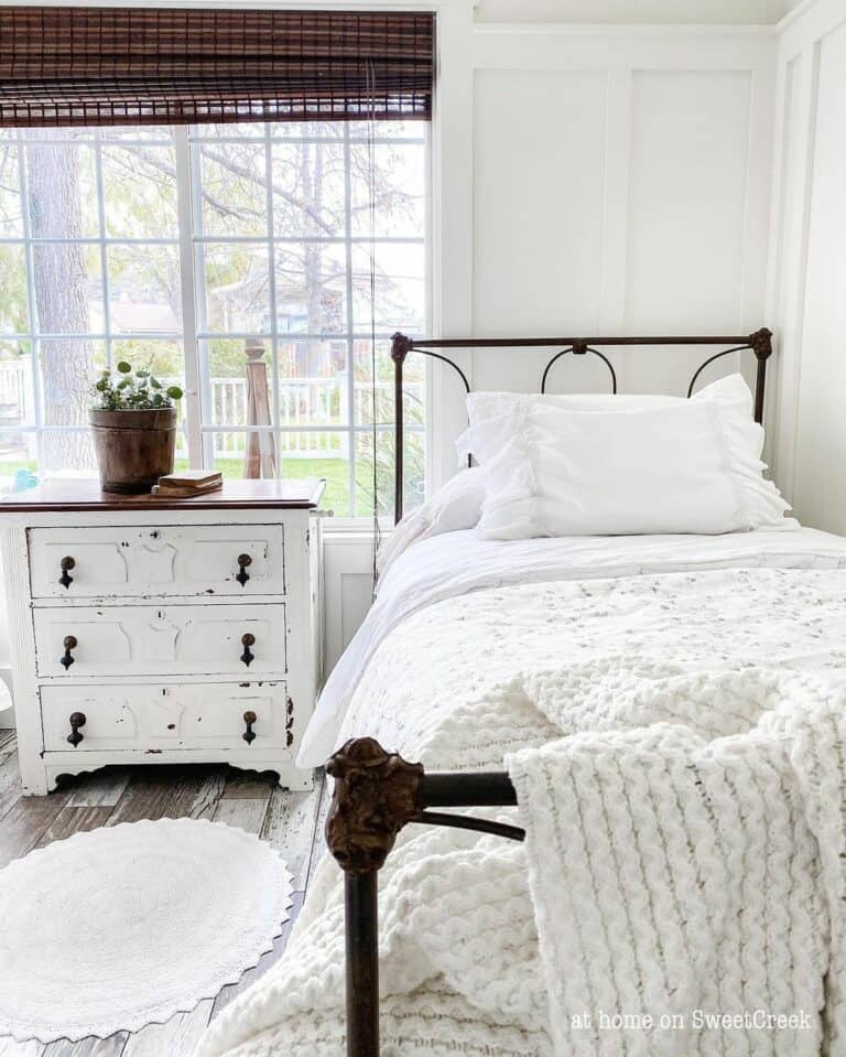 Bronze Metal Bed With White Bedding