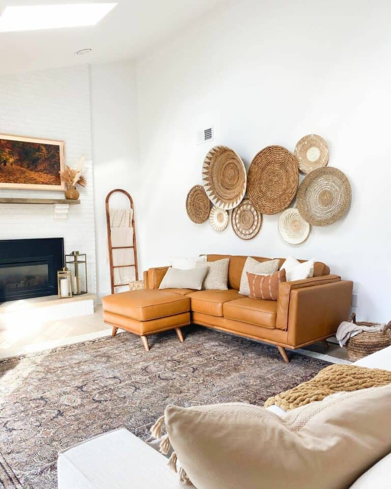 Brown Leather Couch With Rattan Wall Décor