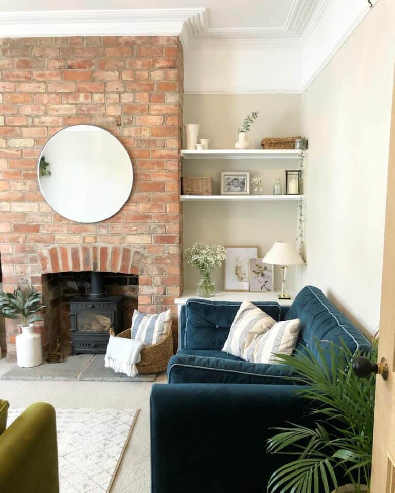 Circular Living Room Mirror on Fireplace Wall
