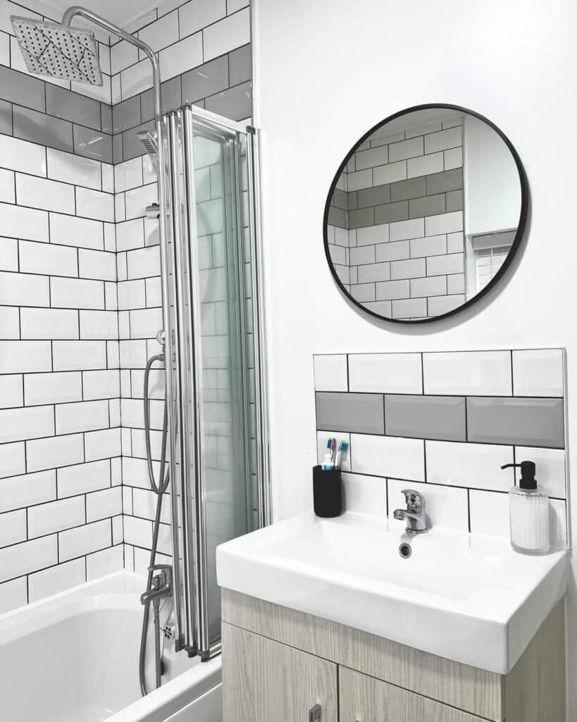 Cohesive Gray and White Backsplash and Shower Tiles