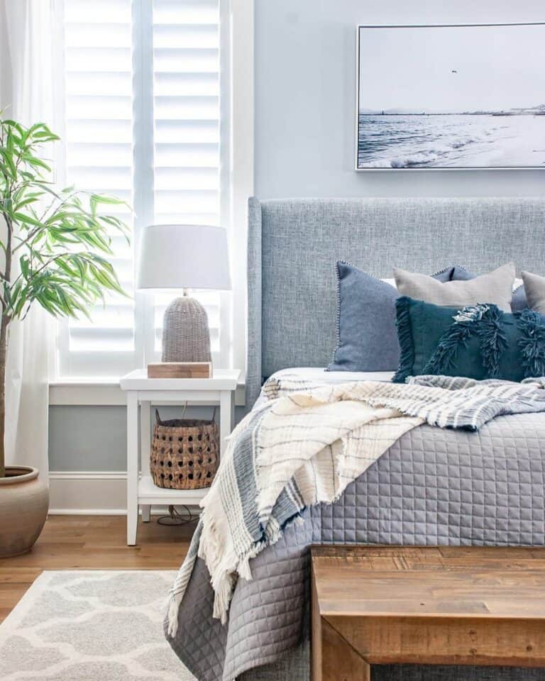 Contemporary Bedroom With White-framed Artwork