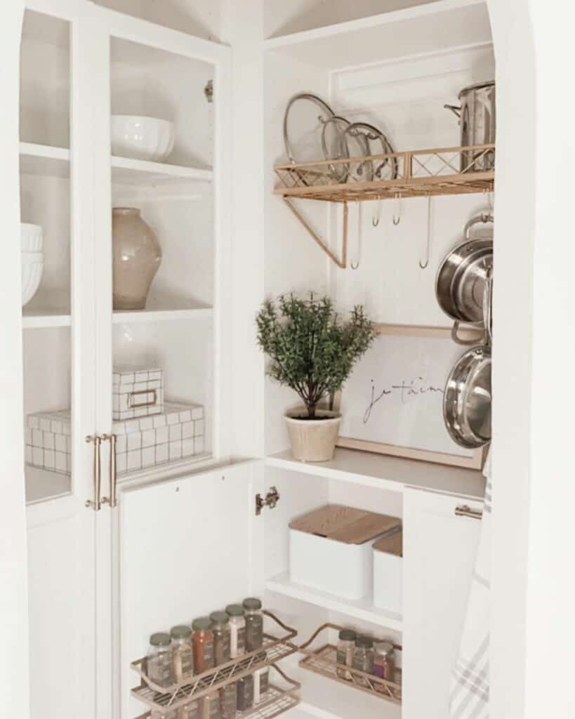 Cookware Displayed on Wooden Shelves