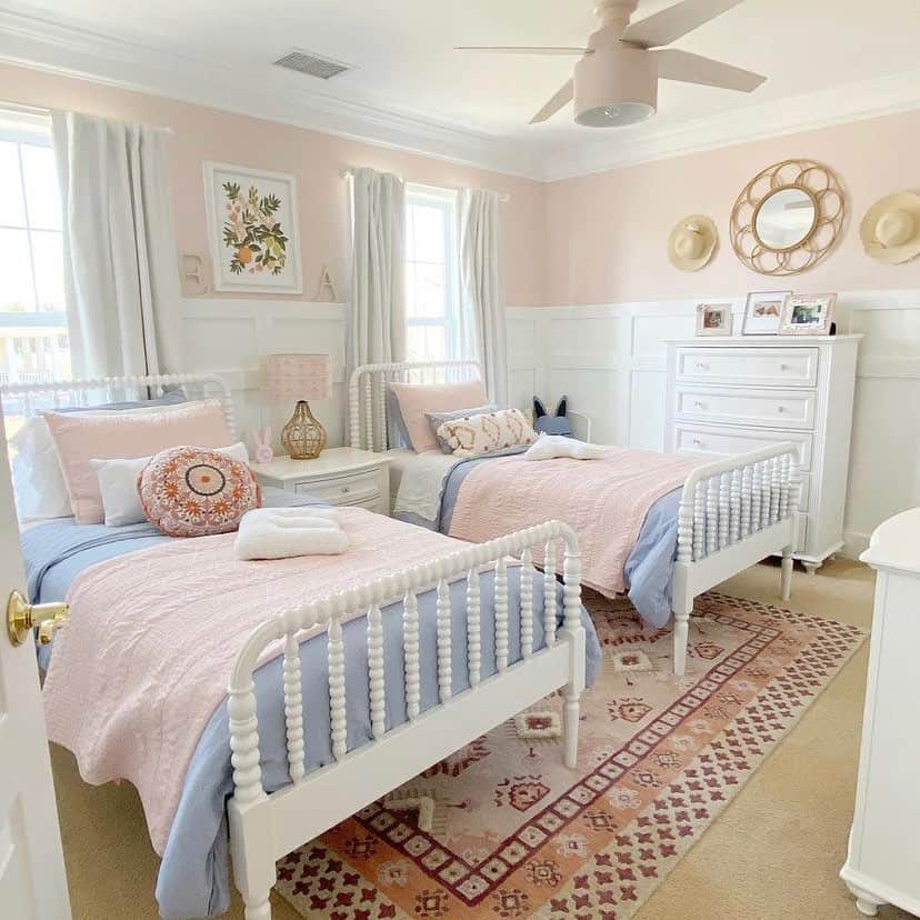 Cozy Bedroom With Blue Coverlets on White Beds