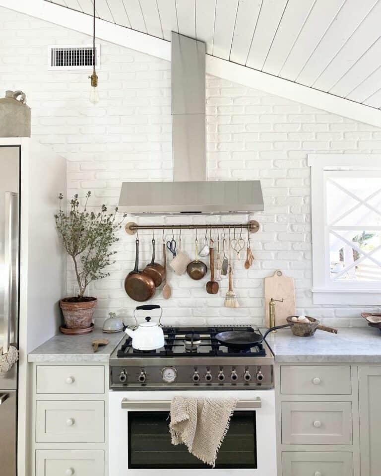 Cream Kitchen Cabinets With White Walls