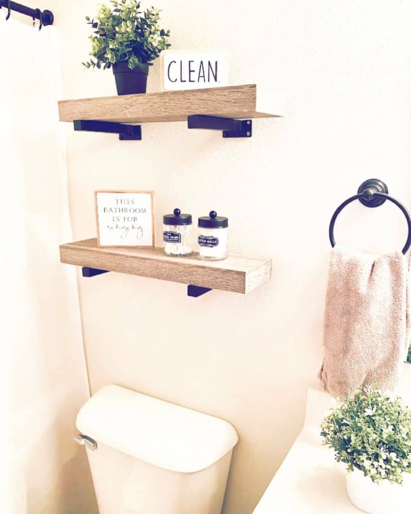 Cream-colored Bathroom Enhanced With Black Accents