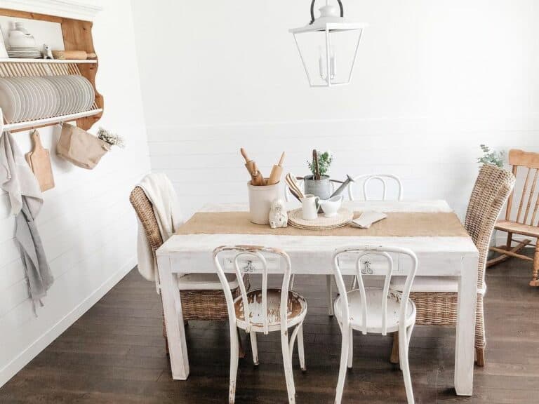 Dark Wood Flooring With White Farmhouse Table