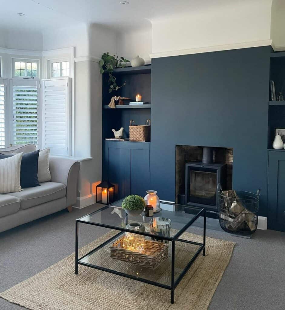 Deep Navy Blue Living Room With Glass Coffee Table