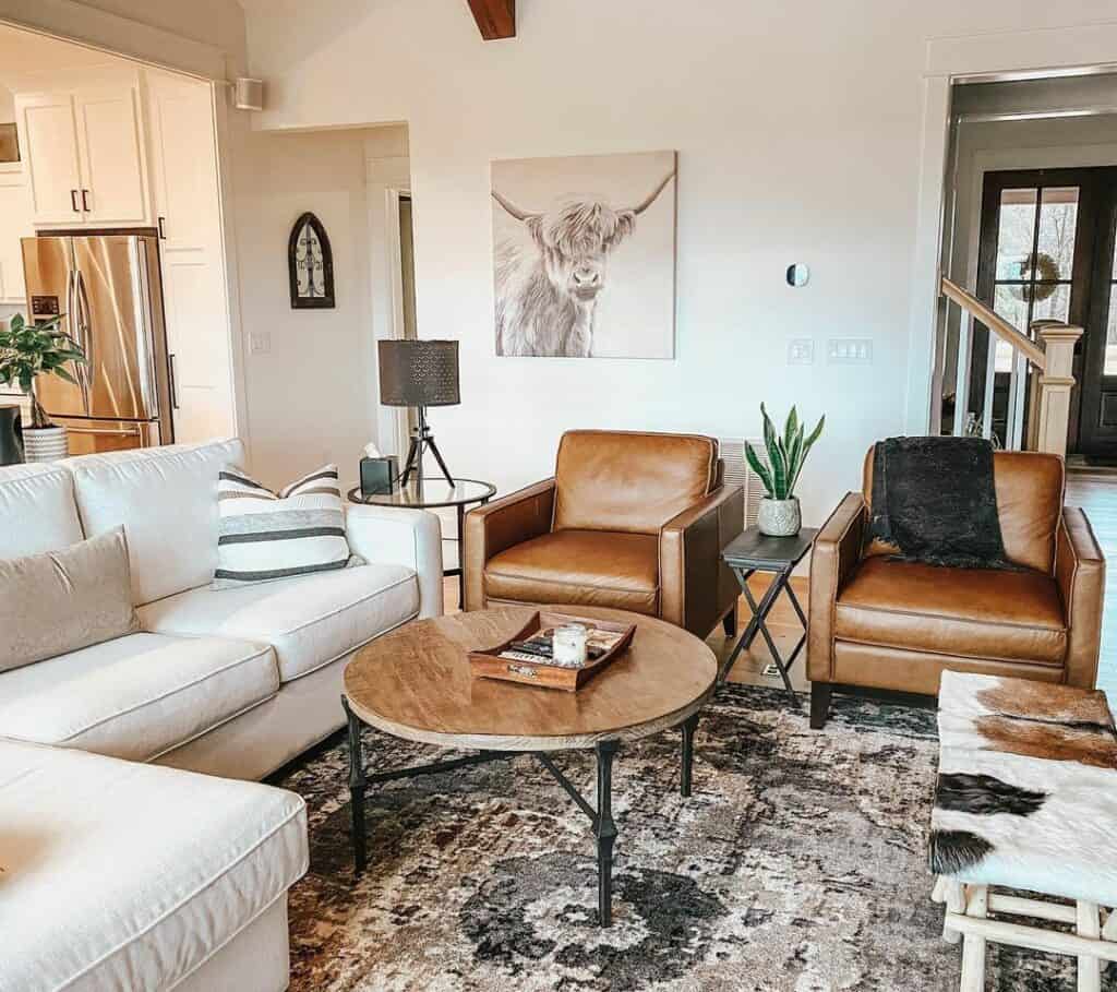 Earth Tone Living Room With Brown Leather Chairs