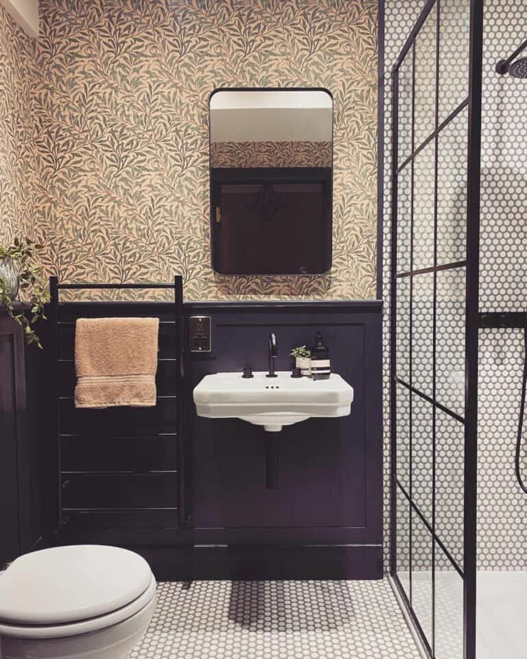 Elegant Bathroom Includes a Penny Tile Shower