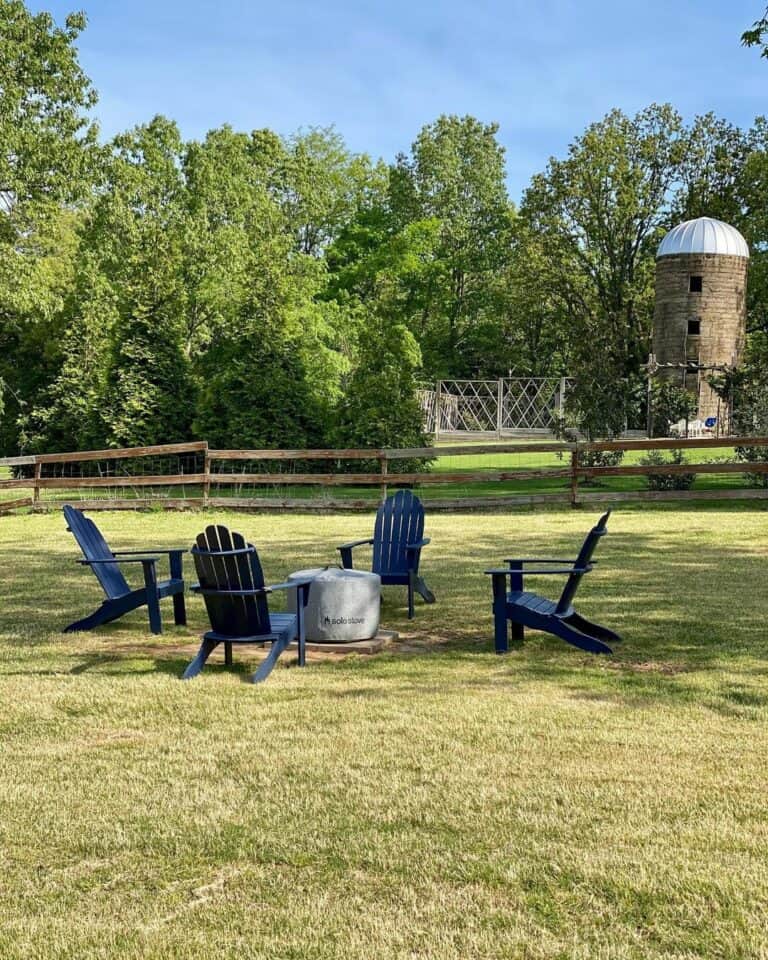 Farmhouse Backyard With Concrete Firepit