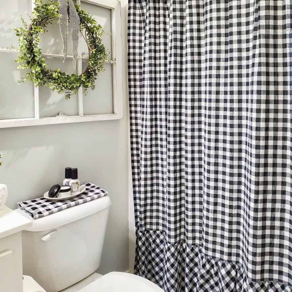 Farmhouse Bathroom With Checkered Shower Curtain