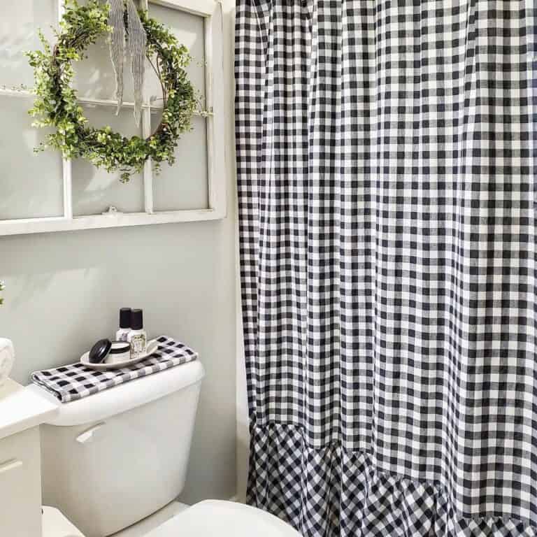 Farmhouse Bathroom With Checkered Shower Curtain