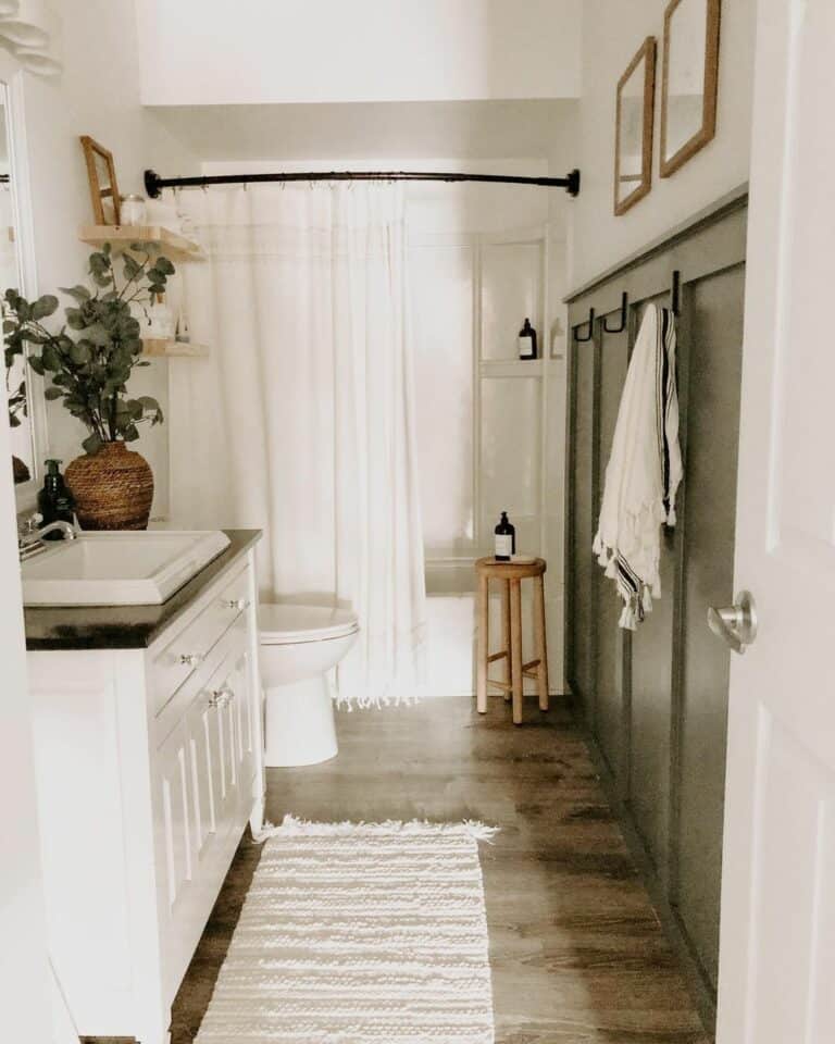 Farmhouse Bathroom With White Shower Curtains