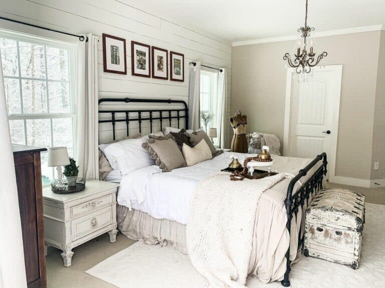 Farmhouse Bedroom With White Shiplap Wall