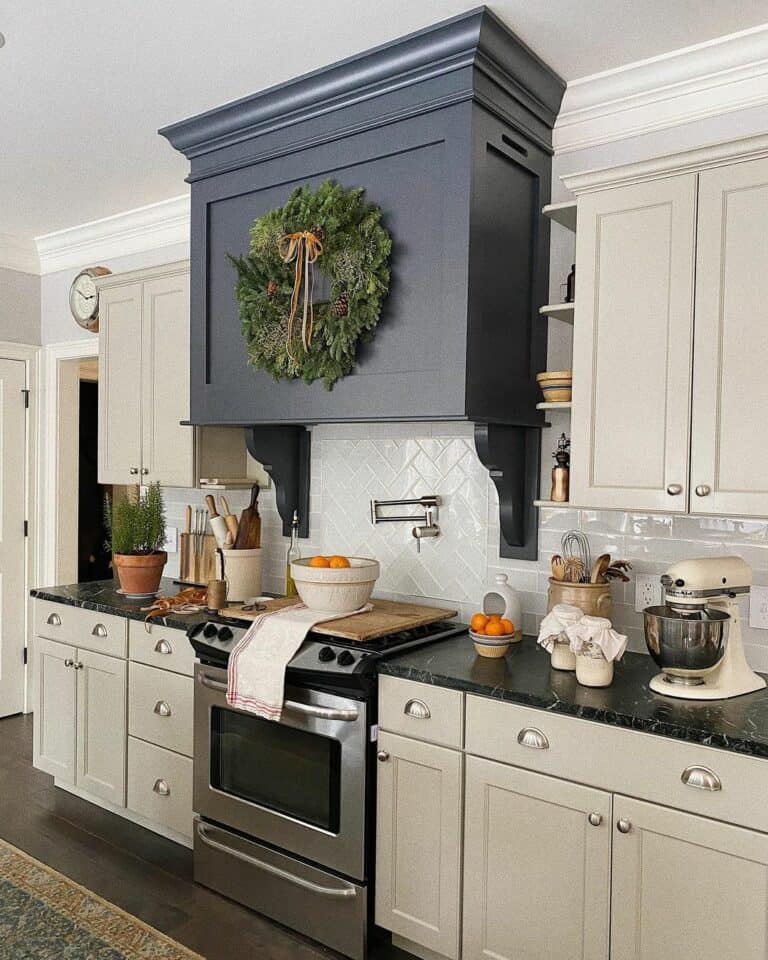 Farmhouse Kitchen With Navy Vent Hood
