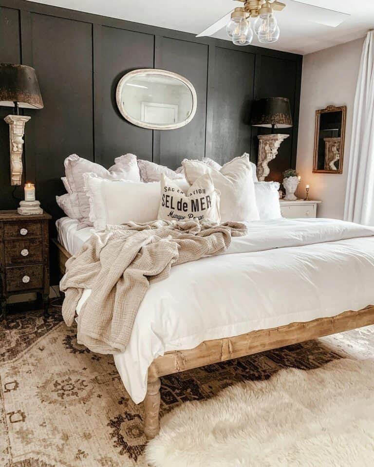 Feminine Black and White Bedroom With Layered Carpets
